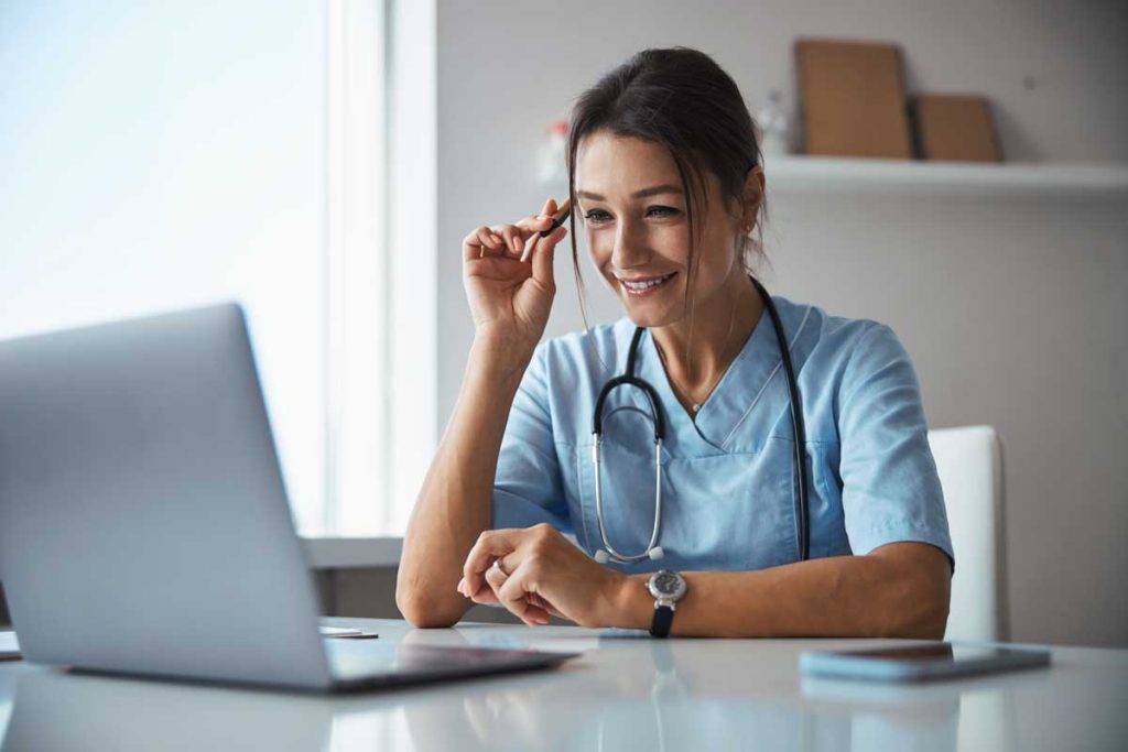 Female Vet Using Laptop